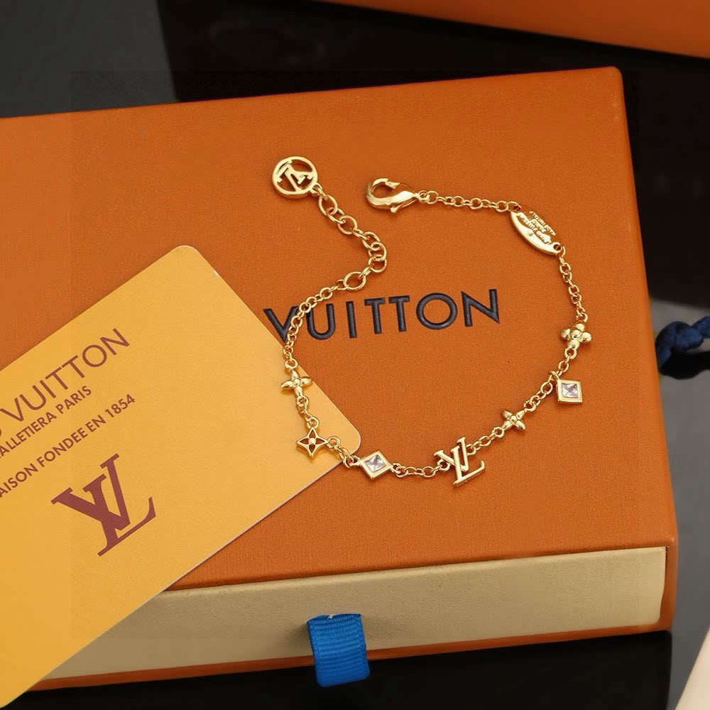 Louis Vuitton Gold Tone Charm Bracelet
